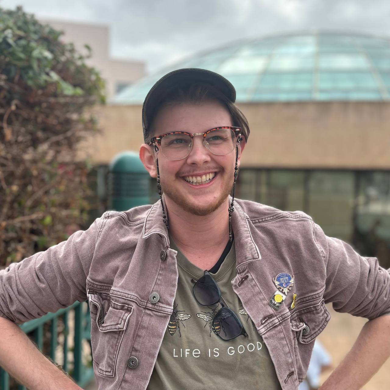A photo of Vide Sale-Reed standing in front of the Love Library dome at SDSU